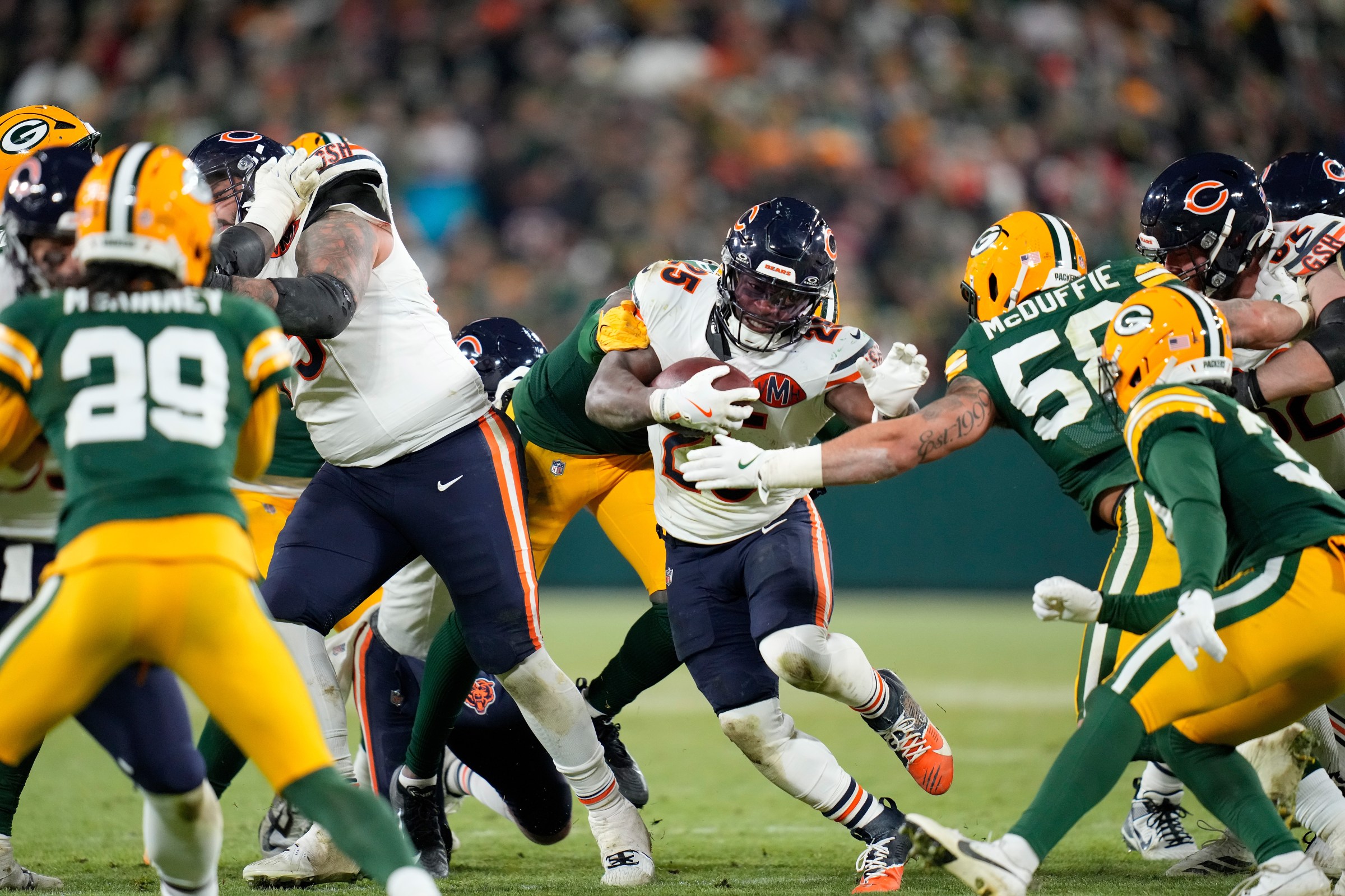 GREEN BAY, WISCONSIN - DECEMBER 07: Kyle Monangai #25 of the Chicago Bears carries the ball during the game against the Green Bay Packers at Lambeau Field on December 07, 2025 in Green Bay, Wisconsin. (Photo by John Fisher/Getty Images)