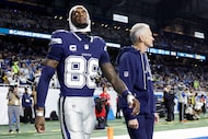 Dallas Cowboys wide receiver Ceedee Lamb (88) leaves the field after suffering a concussion...
