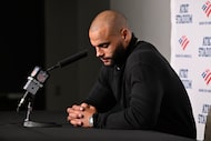 Dallas Cowboys quarterback Dak Prescott speaks during a news conference after an NFL...