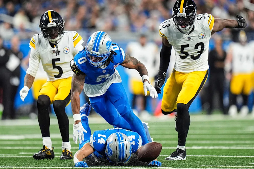 Detroit Lions wide receiver Amon-Ra St. Brown drops a pass intended for him against the Pittsburgh Steelers, as running back Jahmyr Gibbs (0) looks on during the second half at Ford Field in Detroit on Sunday, Dec. 21, 2025.