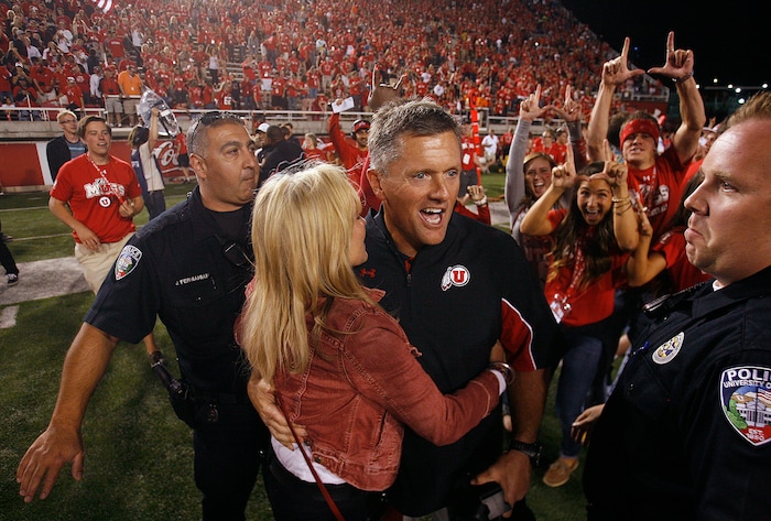 (Scott Sommerdorf | The Salt Lake Tribune) Kyle Whittingham gets congratulated by his wife, Jamie, after Utah defeated BYU, Sept. 15, 2012.