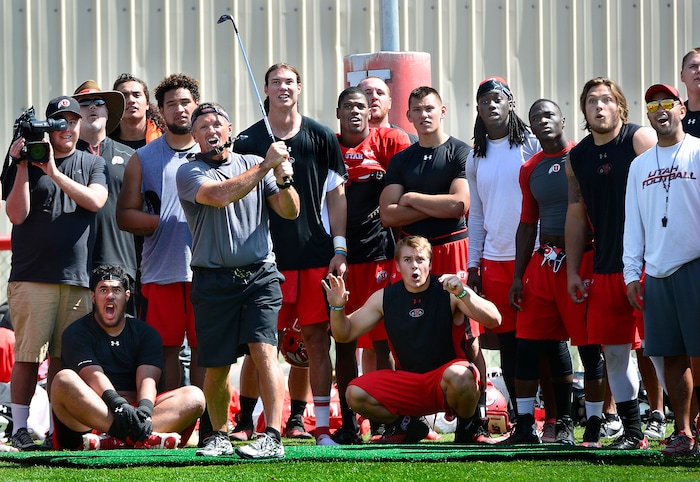 (Scott Sommerdorf | The Salt Lake Tribune) Kyle Whittingham follows through on a golf shot as the team held a golf competition after a football practice in 2014.