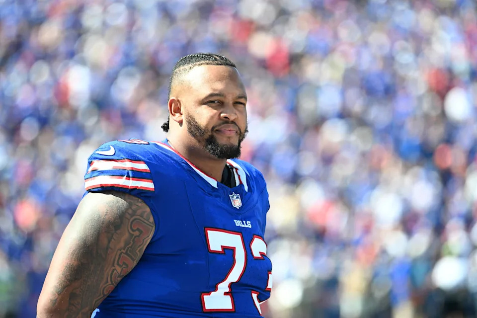 Sep 28, 2025; Orchard Park, New York, USA; Buffalo Bills offensive tackle Dion Dawkins (73) on the sidelines during the second quarter against the New Orleans Saints at Highmark Stadium. Mandatory Credit: Mark Konezny-Imagn Images