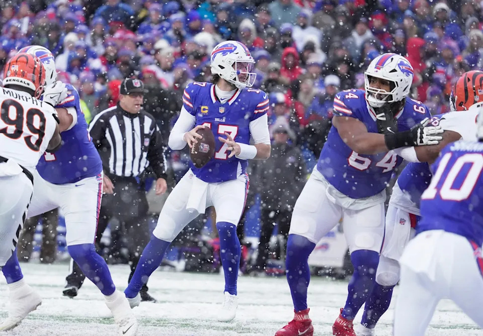 Buffalo Bills quarterback Josh Allen looks towards a receiver to throw to during second half action at Highmark Stadium in Orchard Park on Dec. 7, 2025.