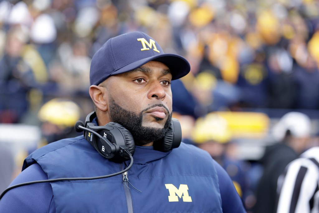 University of Michigan Football Coach Sherrone Moore on the sidelines before the Michigan Ohio State game in Ann Arbor, Michigan on November 29, 2025.