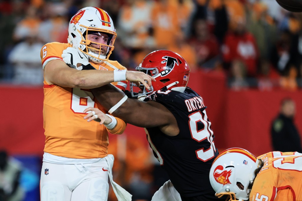 Tampa Bay Buccaneers quarterback Baker Mayfield (6) throws a pass against Atlanta Falcons defensive tackle David Onyemata (90) during the second quarter at Raymond James Stadium.
