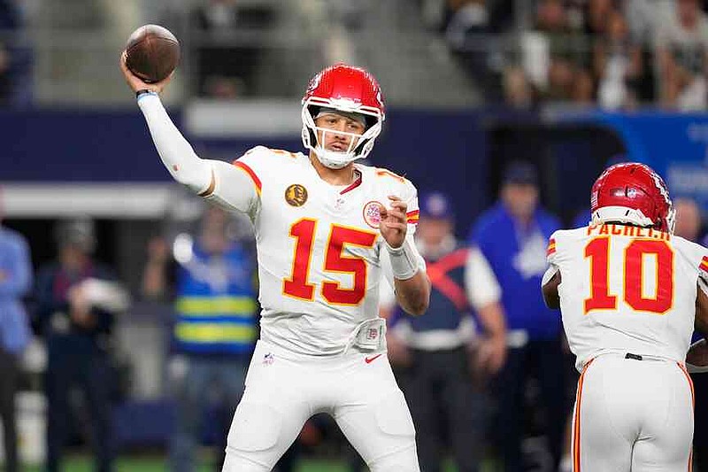 Kansas City Chiefs quarterback Patrick Mahomes throws during the second half of an NFL football game against the Dallas Cowboys Thursday, Nov. 27, 2025, in Arlington, Texas. (AP Photo/Tony Gutierrez)