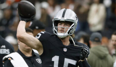 Raiders quarterback Kenny Pickett (15) throws a pass during a warm up before an NFL football ga ...
