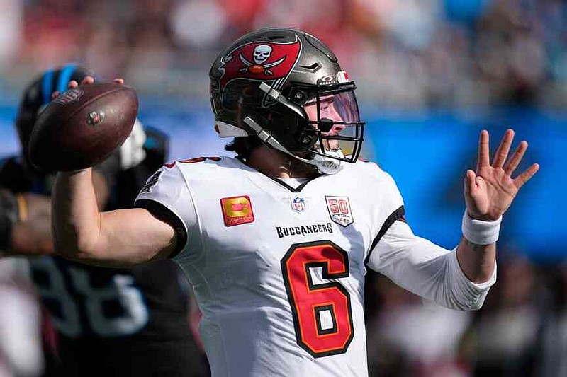 Tampa Bay Buccaneers quarterback Baker Mayfield passes against the Carolina Panthers during the first half of an NFL football game, Sunday, Dec. 21, 2025, in Charlotte, N.C. (AP Photo/Jacob Kupferman)