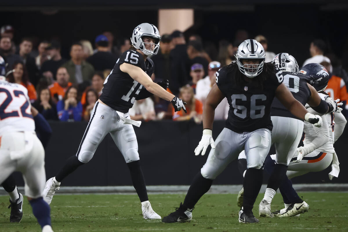 Raiders quarterback Kenny Pickett (15) throws a pass during the second half of an NFL game agai ...