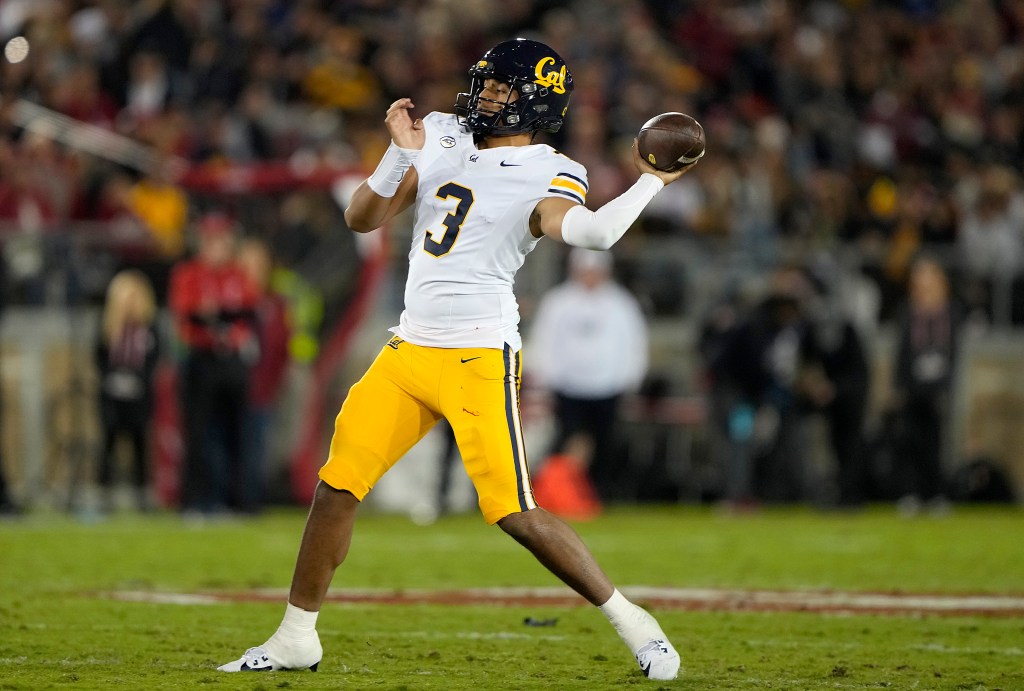 California's Jayden Ott wearing number 3, prepares to throw a pass.