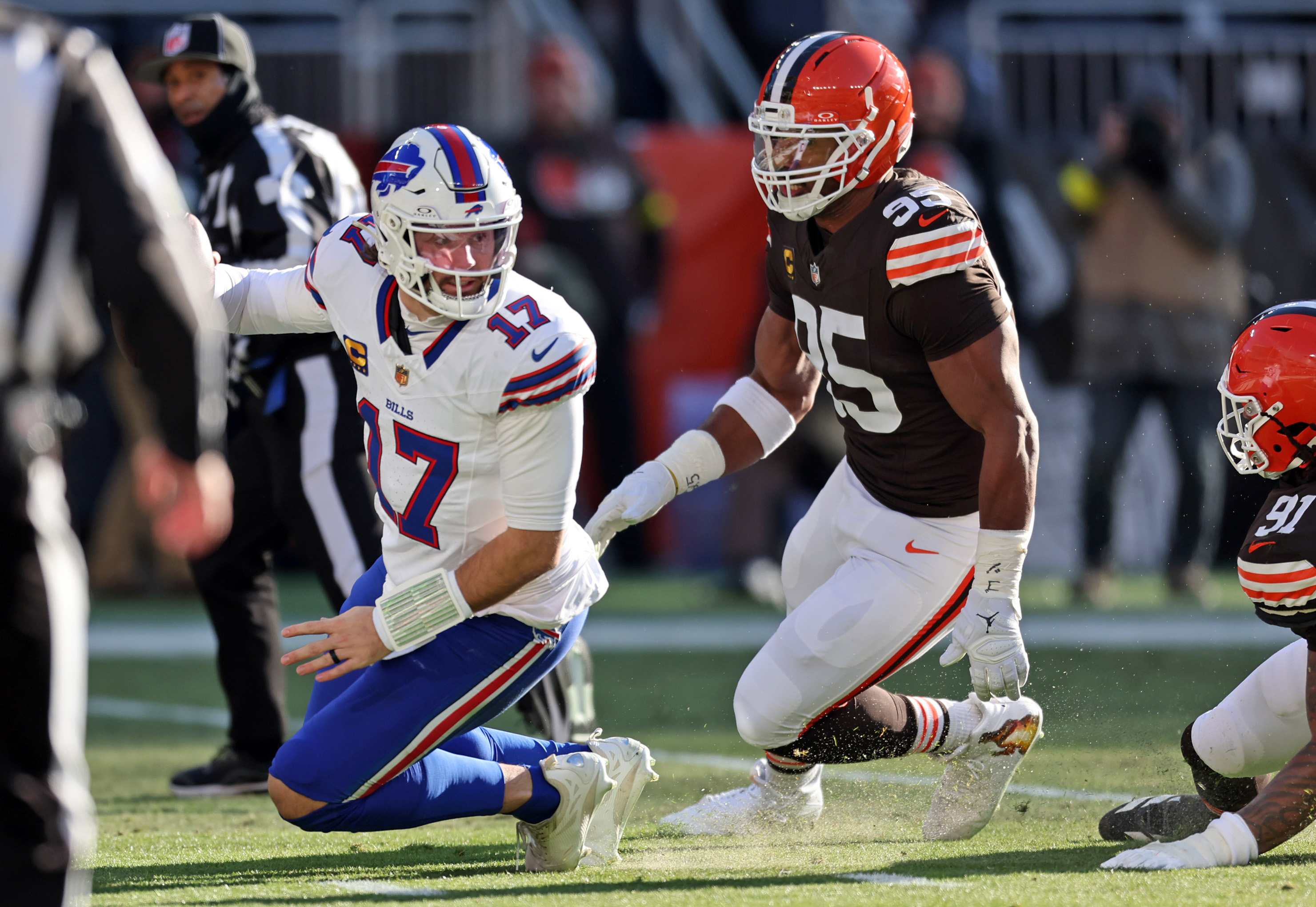 Cleveland Browns defensive end Myles Garrett pressures Buffalo Bills quarterback Josh Allen, forcing him to give himself up at the one yard line, and earning a half a sack in the first half. 