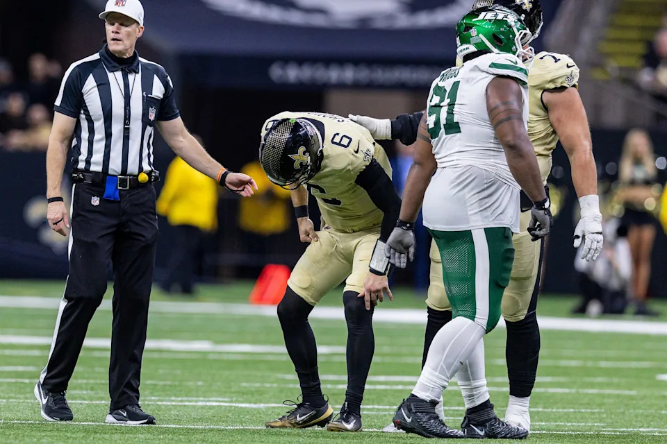 Dec 21, 2025; New Orleans, Louisiana, USA; New Orleans Saints quarterback Tyler Shough (6) gets up after a tackle by New York Jets defensive end Jowon Briggs (91) during the second half at Caesars Superdome. Mandatory Credit: Stephen Lew-Imagn Images