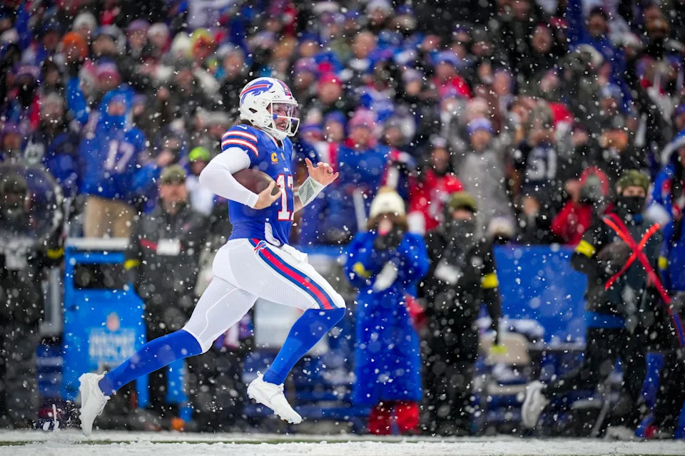 Bills quarterback Josh Allen breaks away for a 40-yard touchdown run with 7:33 remaining in the fourth quarter. The TD cut the Bengals lead to 28-25.