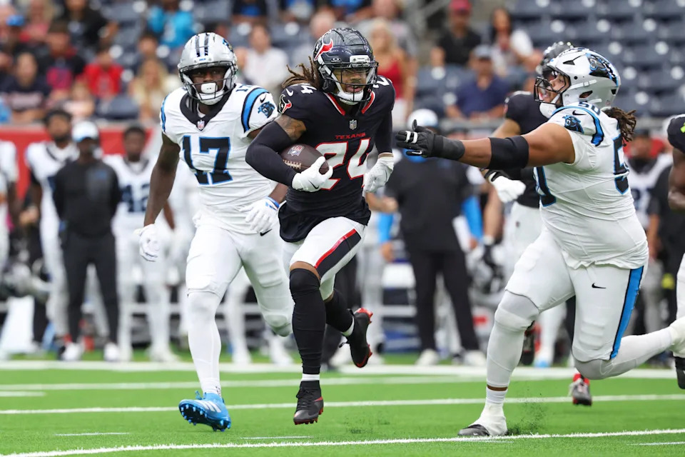 Aug 16, 2025; Houston, Texas, USA; Houston Texans cornerback Derek Stingley Jr. (24) runs with the ball during the first quarter against the Carolina Panthers at NRG Stadium. Mandatory Credit: Troy Taormina-Imagn Images