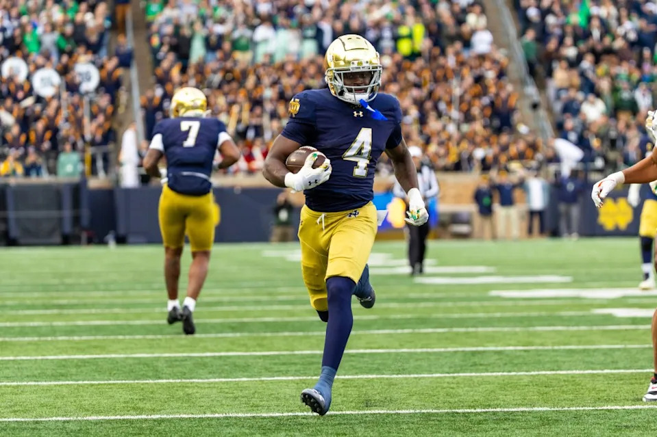 Notre Dame Fighting Irish running back Jeremiyah Love (4) breaks loose for a touchdown run against the Syracuse Orange during the first half at Notre Dame Stadium. Michael Caterina-Imagn Images