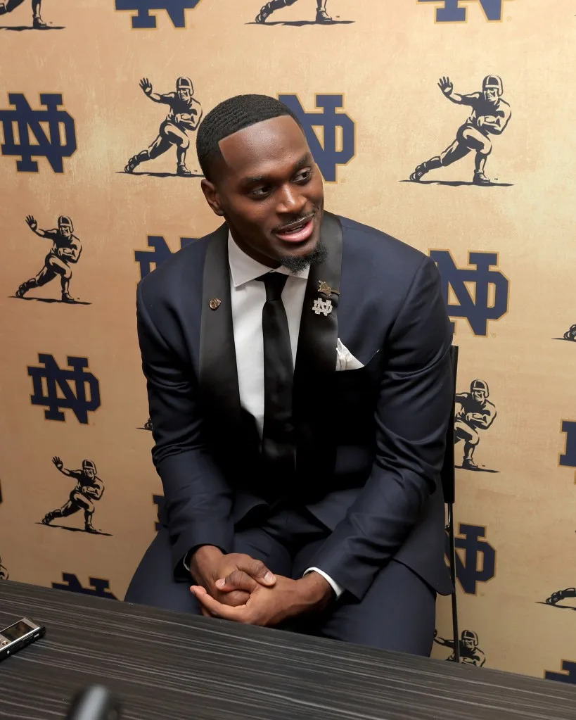 Notre Dame Fighting Irish running back Jeremiyah Love speaks to the media during a press conference at the New York Marriott Marquis before the presentation of the Heisman Trophy. Brad Penner-Imagn Images