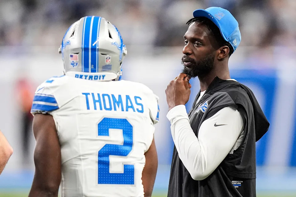 Detroit Lions safety Kerby Joseph (31), right, talks to safety Daniel Thomas (2) at a timeout against Dallas Cowboys during the second half at Ford Field in Detroit on Thursday, Dec. 4, 2025.