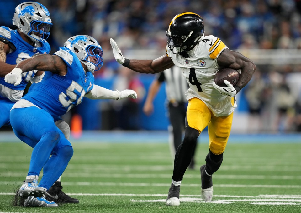  DK Metcalf #4 of the Pittsburgh Steelers runs with the ball during the fourth quarter against the Detroit Lions at Ford Field on December 21, 2025 in Detroit, Michigan.