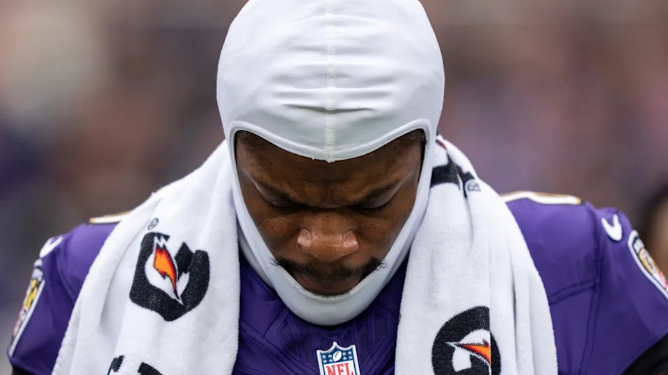 BALTIMORE, MARYLAND - NOVEMBER 23: Lamar Jackson #8 of the Baltimore Ravens looks on during the national anthem prior to an NFL football game against the New York Jets at M&T Bank Stadium on November 23, 2025 in Baltimore, Maryland. (Photo by Michael Owens/Getty Images)