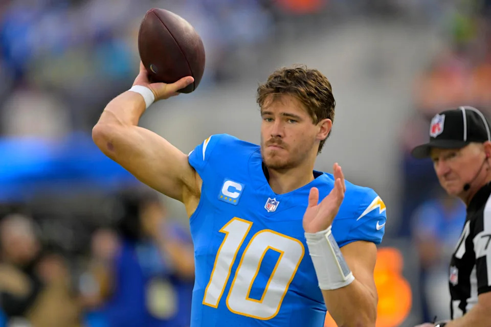 Los Angeles Chargers quarterback Justin Herbert (10) warms up prior to the game against the Tampa Bay Buccaneers.Jayne Kamin-Oncea-Imagn Images
