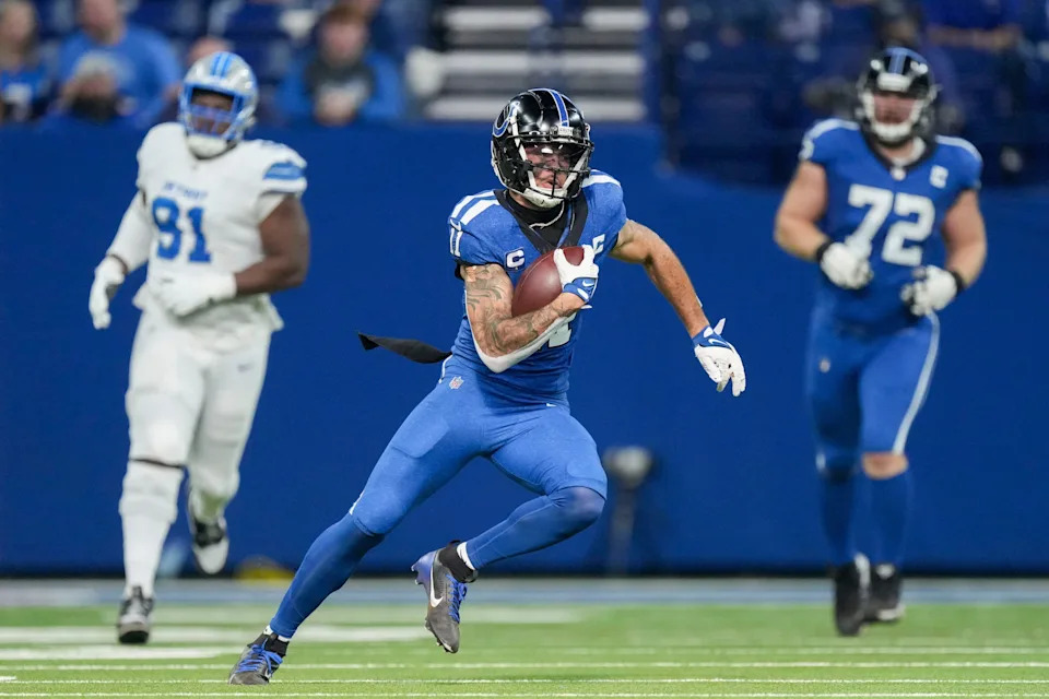 Indianapolis Colts wide receiver Michael Pittman Jr. (11) rushes the ball Sunday, Nov. 24, 2024, during a game against the Detroit Lions at Lucas Oil Stadium in Indianapolis.