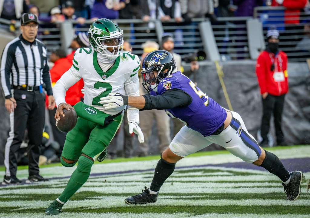 Baltimore Ravens linebacker Kyle Van Noy (53) pressures New York Jets quarterback Tyrod Taylor (2) in the end zone during the 4th quarter against the New York Jets. The Ravens beat the Jets 23-10 at M&T Bank Stadium.