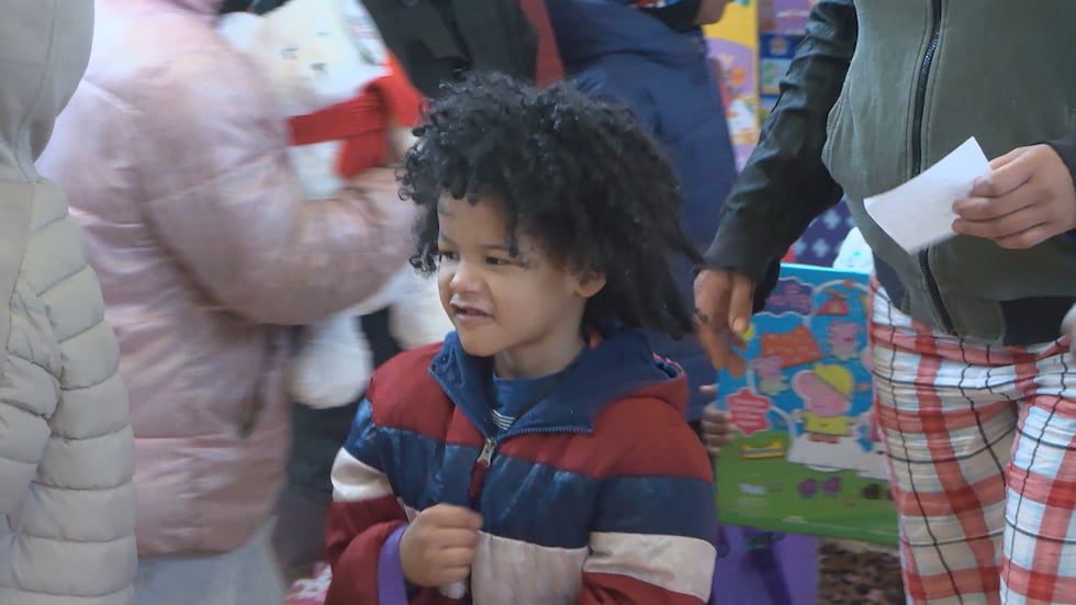 CHILD AT DELPIT CHRISTMAS GIVEAWAY