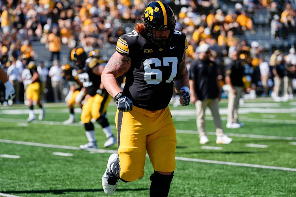 Iowa Hawkeyes offensive lineman Gennings Dunker (67) warms up before a football game against the Indiana Hoosiers Sept. 27, 2025 at Kinnick Stadium in Iowa City, Iowa.