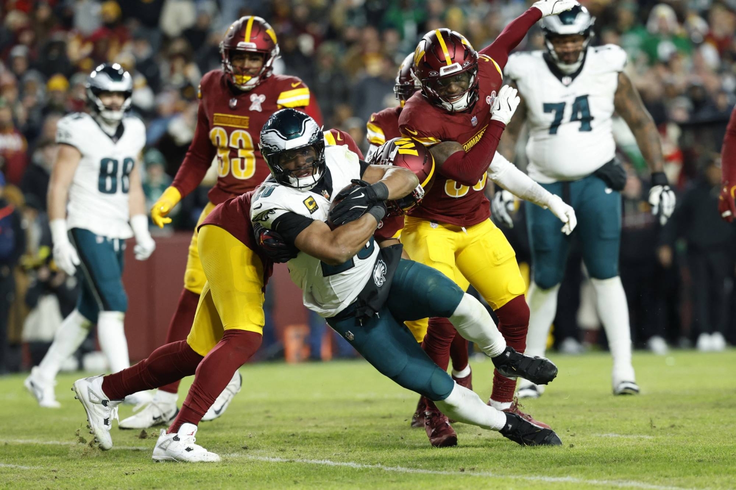 Eagles win division as Commanders clash descends into brawl