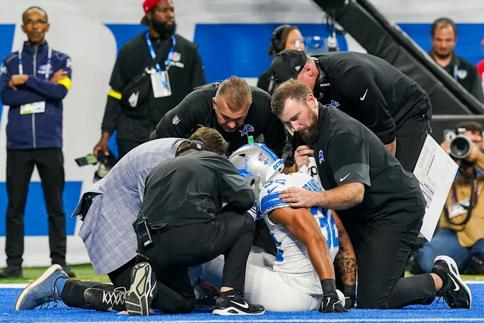 Detroit Lions safety Brian Branch (32) is injured while playing against the Dallas Cowboys during the second half at Ford Field in Detroit on Thursday, Dec. 4, 2025.
