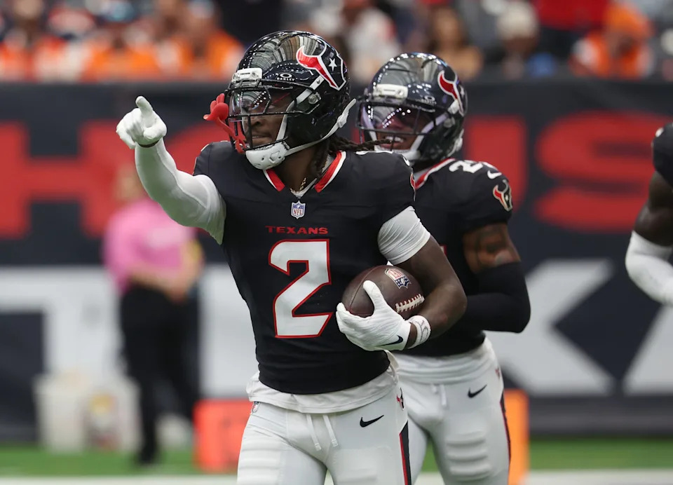 Nov 2, 2025; Houston, Texas, USA; Houston Texans safety Calen Bullock (2) celebrates after an interception during the first half Denver Broncos at NRG Stadium. Mandatory Credit: Thomas Shea-Imagn Images