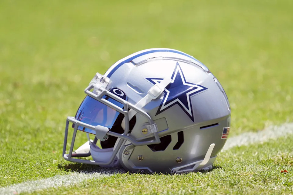 A Dallas Cowboys helmet with Oakley visor.