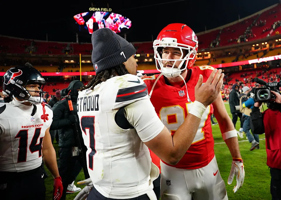 Houston Texans quarterback C.J. Stroud (7) and Kansas City Chiefs tight end Travis Kelce (87) greet each other after the game at GEHA Field at Arrowhead Stadium. <br>Denny Medley-Imagn Images
