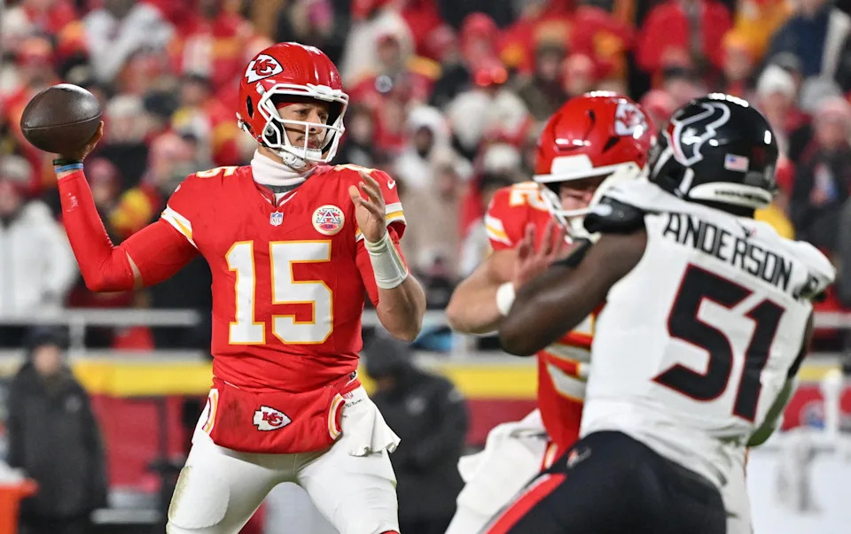 Kansas City Chiefs quarterback Patrick Mahomes (15) throws a pass as Houston Texans defensive end Will Anderson Jr. (51) rushes during the second quarter at GEHA Field at Arrowhead Stadium. <br>Amy Kontras-Imagn Images