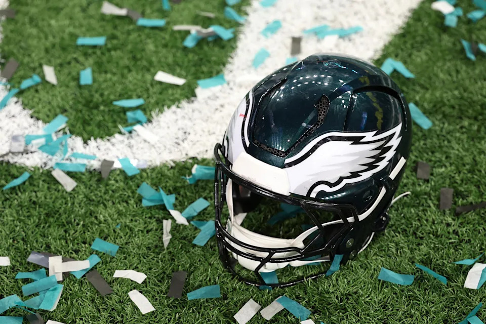 A Philadelphia Eagles player's helmet rests on the field after Super Bowl LIX against the Kansas City Chiefs at Caesars Superdome.
