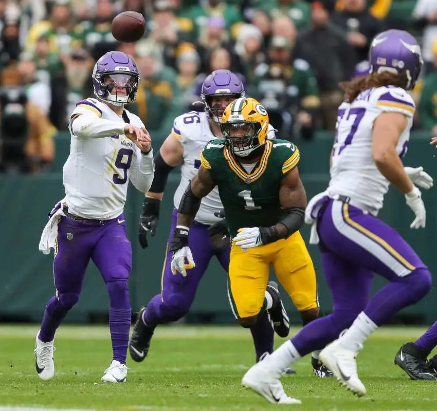 Minnesota Vikings quarterback J.J. McCarthy (9) passes the ball against the Green Bay Packers on Sunday, November 23, 2025, at Lambeau Field in Green Bay, Wis.<br> Tork Mason/USA TODAY NETWORK-Wisconsin