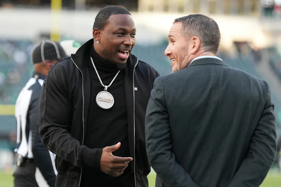Philadelphia Eagles Hall of Fame running back LeSean McCoy chats with Philadelphia Eagles general manager Howie Roseman during the game between the Philadelphia Eagles and the Jacksonville Jaguars on November 3, 2024 at Lincoln Financial Field in Philadelphia, PA. Icon Sportswire via Getty Images