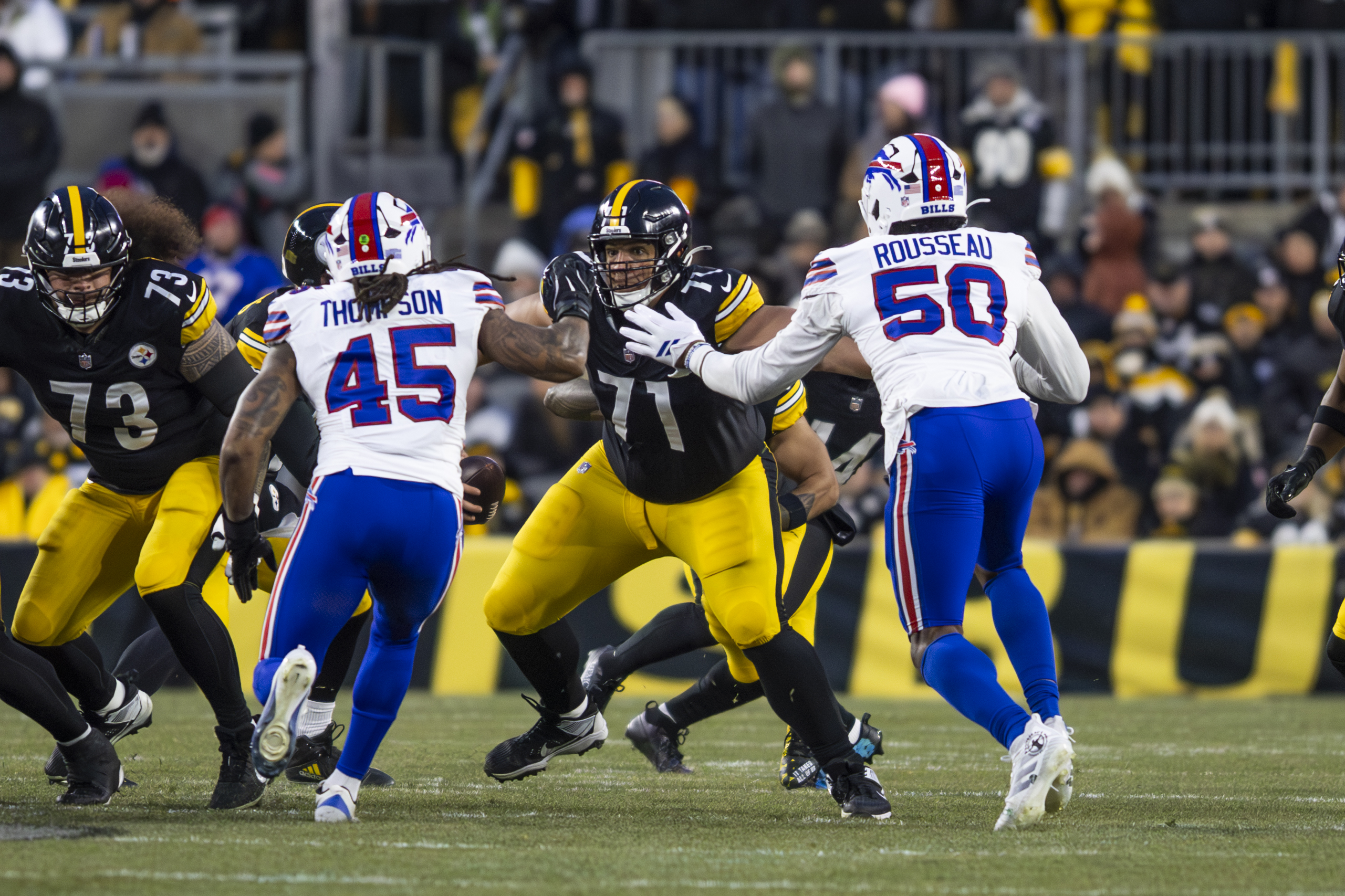Pittsburgh Steelers guard Andrus Peat (71), Buffalo Bills linebacker Shaq Thompson (45) & Buffalo Bills defensive end Greg Rousseau (50) in-game. Pittsburgh Steelers vs. Buffalo BillsKylee Surike | Special to PennLive