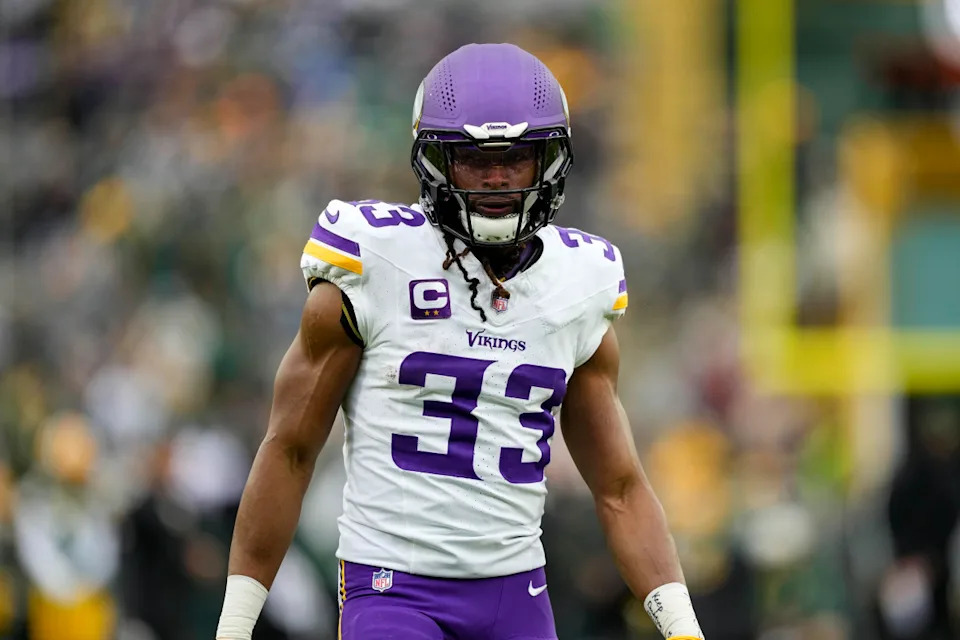 Nov 23, 2025; Green Bay, Wisconsin, USA; Minnesota Vikings running back Aaron Jones Sr. (33) during warmups prior to the game against the Green Bay Packers at Lambeau Field. Mandatory Credit: Jeff Hanisch-Imagn Images