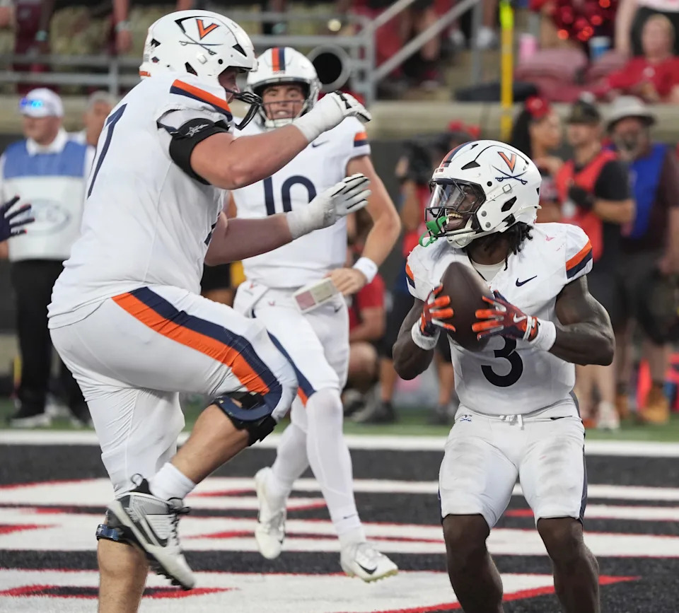 Virginia’s J’Mari Taylor gets the game winning touchdown against Louisville at L&N Stadium Saturday.
Oct. 4, 2025