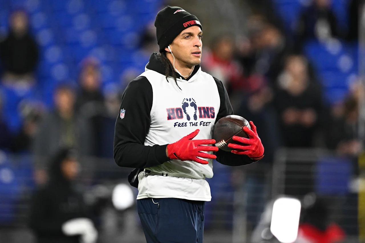 New England Patriots wide receiver Mack Hollins works out during pre-game warm-ups before an NFL football game against the Baltimore Ravens, Sunday, Dec. 21, 2025, in Baltimore. (AP Photo/Terrance Williams)