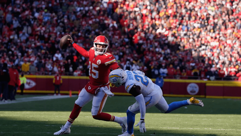 {p}Kansas City Chiefs quarterback Patrick Mahomes (15) scrambles as Los Angeles Chargers safety Tony Jefferson (23) defends during the first half of an NFL football game Sunday, Dec. 14, 2025, in Kansas City, Mo. (AP Photo/Ed Zurga){/p}