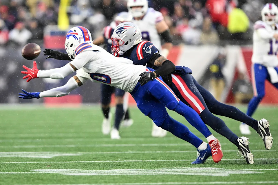 Dec 14, 2025; Foxborough, Massachusetts, USA; New England Patriots cornerback Carlton Davis III (7) draws a pass interference penalty breaking up a catch intended for Buffalo Bills wide receiver Keon Coleman (0) during the second half at Gillette Stadium. Mandatory Credit: Brian Fluharty-Imagn Images