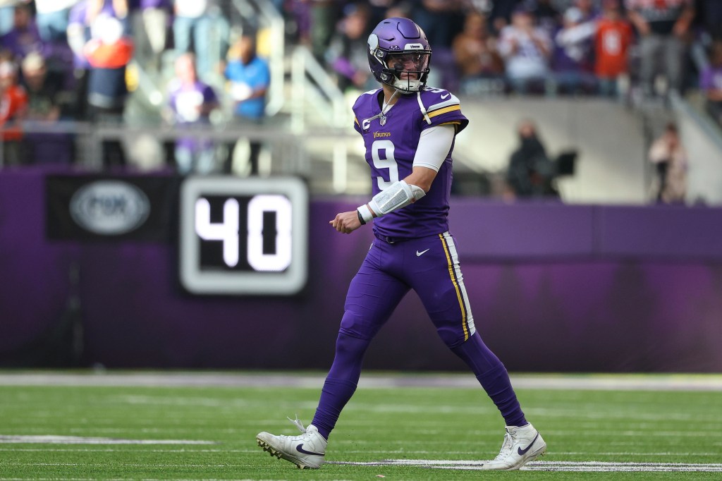 Minnesota Vikings quarterback J.J. McCarthy (9) reacts after throwing an interception.
