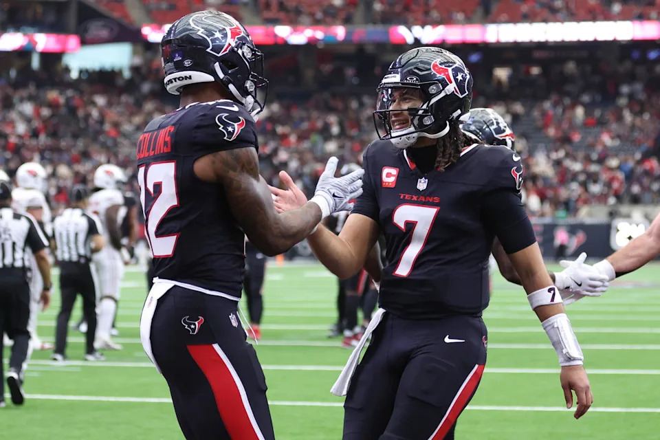 Houston Texans quarterback C.J. Stroud (7) celebrates with wide receiver Nico Collins (12) after a touchdown during the second half against the Arizona Cardinals at NRG Stadium. <br>Troy Taormina-Imagn Images