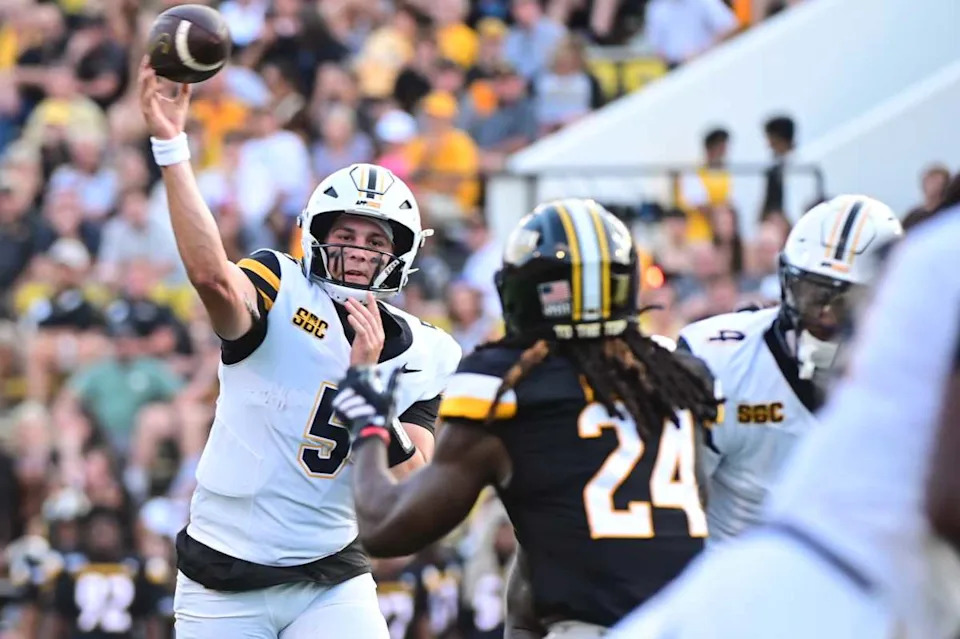 Appalachian State Mountaineers quarterback AJ Swann (5) makes a pass against the Southern Miss Golden Eagles during the first quarter at M.M. Roberts Stadium in Hattiesburg, Mississippi, on September 13, 2025.Matt Bush/Special to the Clarion Ledger / USA TODAY NETWORK via Imagn Images