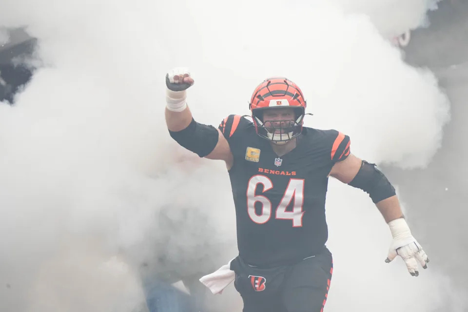 Bengals Ted Karras (64) enter the field before their game against the Bears at Paycor Stadium on Sunday November 2, 2025.