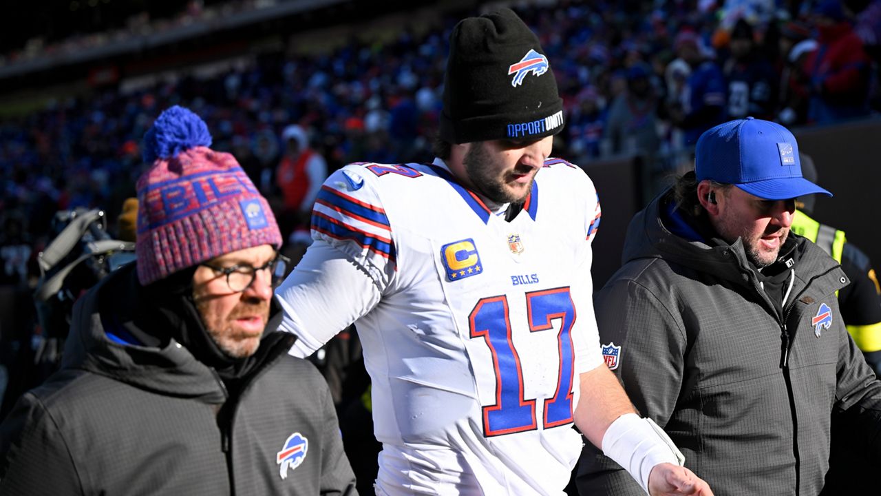Buffalo Bills quarterback Josh Allen (17) leaves the field after an injury against the Cleveland Browns during the first half of an NFL football game in Cleveland, Sunday, Dec. 21, 2025. (AP Photo/David Richard)