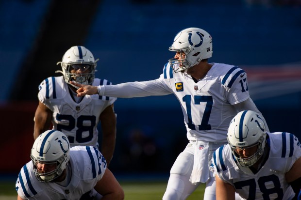 Indianapolis Colts quarterback Philip Rivers (17) stands behind the line against the Buffalo Bills during the second quarter of an NFL wild-card playoff football game, Saturday, Jan. 9, 2021, in Orchard Park, N.Y. (AP Photo/Brett Carlsen)